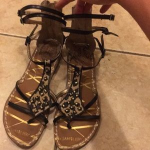 Sam Libby cheetah print gladiator sandals.